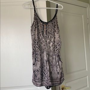 Black and white patterned romper with pockets